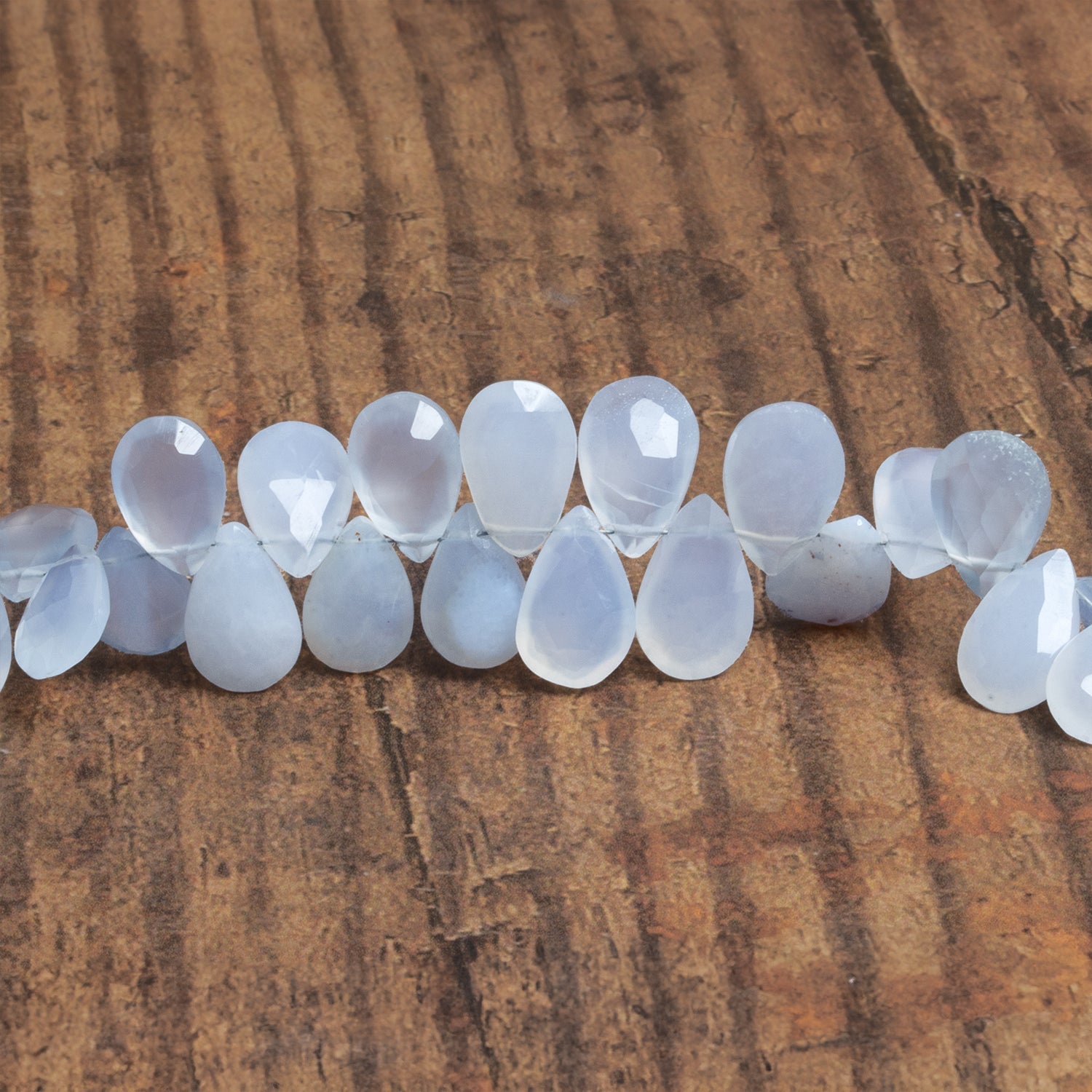 11x8mm Turkish Chalcedony Faceted Pears 8 inch 48 beads – The Bead Traders