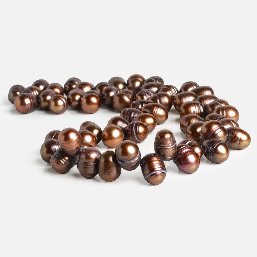 12x9mm Copper Brown Ringed Oval Pearls 15 inch 55 beads - The Bead Traders