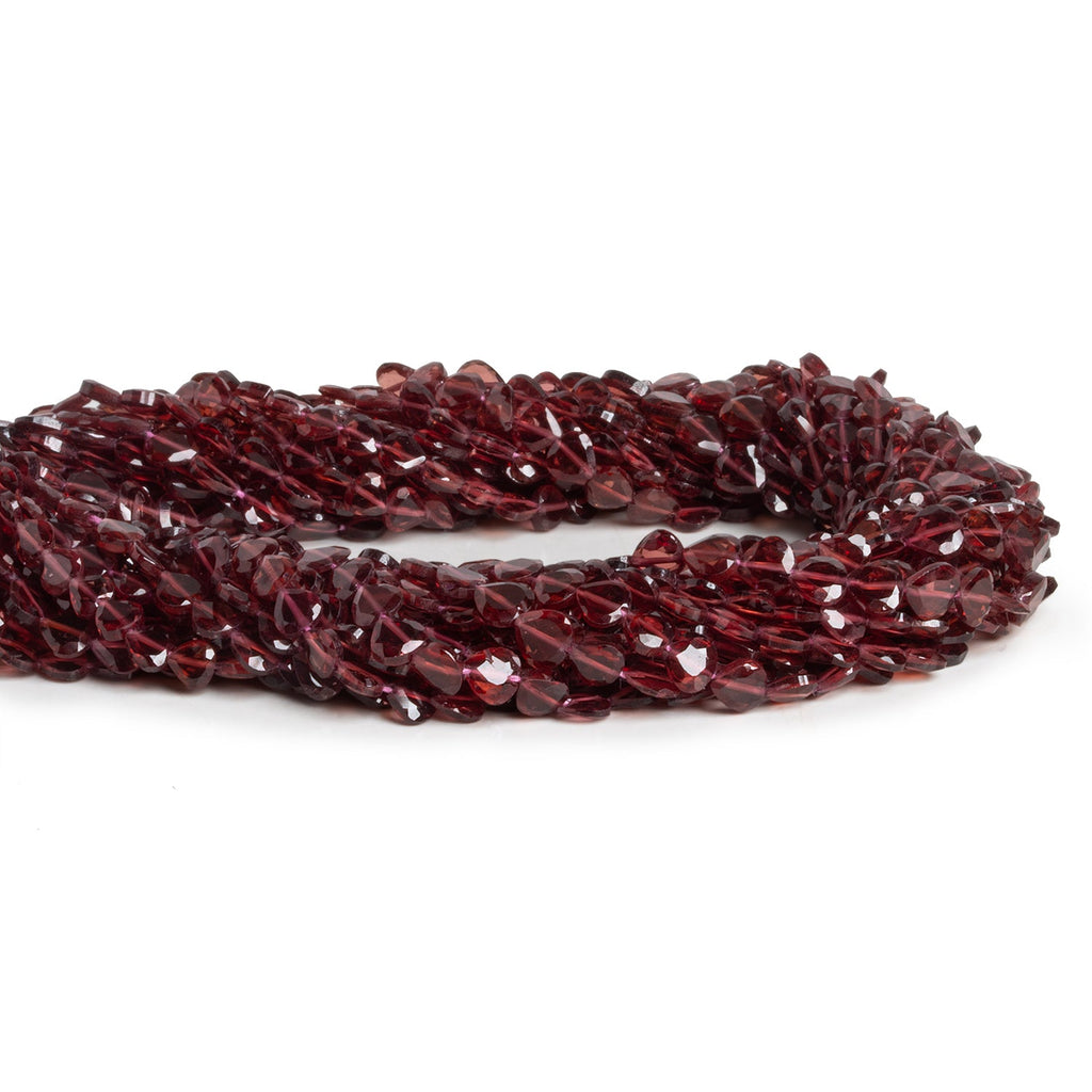 4 - 5mm Mozambique Garnet Faceted Hearts 12 inch 73 beads - The Bead Traders