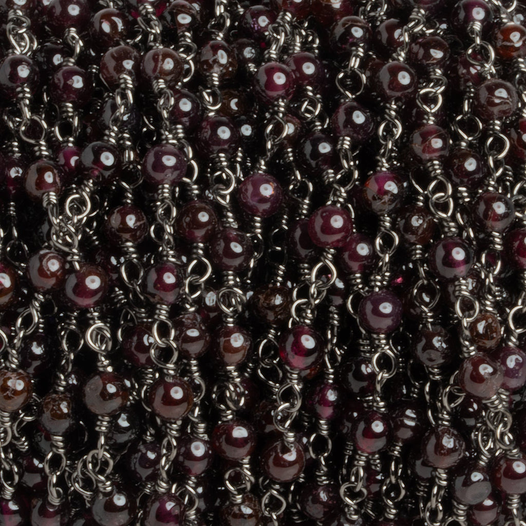 4mm Garnet Round Black Gold Chain 32 beads - The Bead Traders