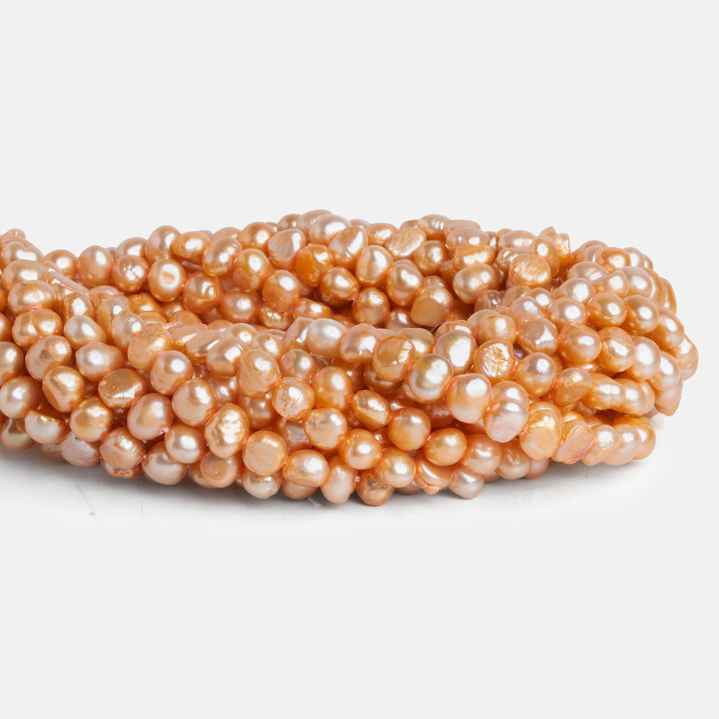 5 - 6mm Yellow Peach Baroque Pearls 15 inch 80 beads - The Bead Traders