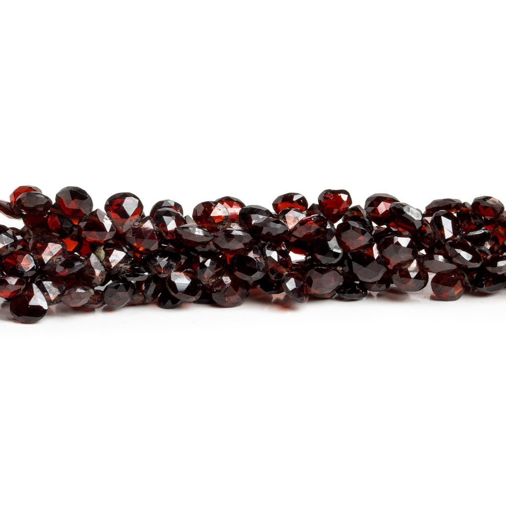 5mm Garnet Faceted Hearts 7.5 inch 65 beads - The Bead Traders