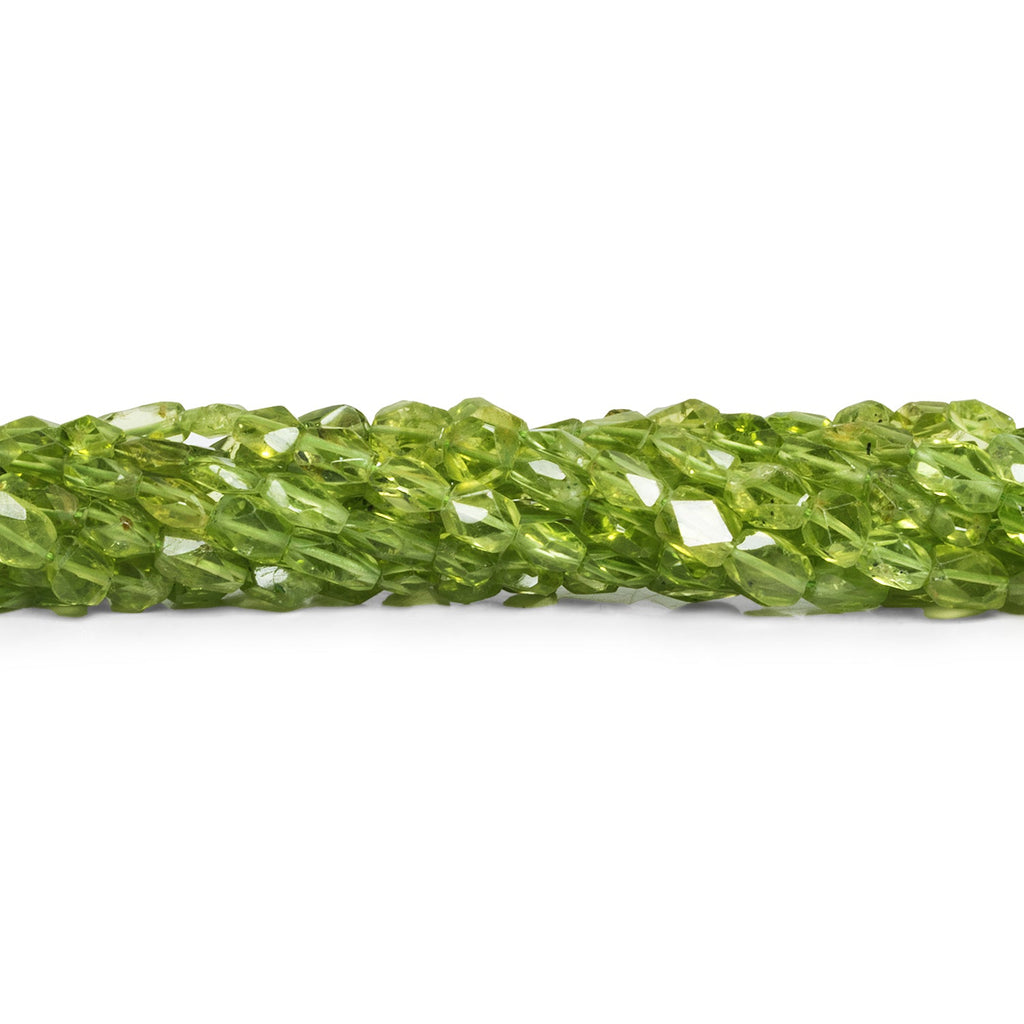 5x4mm Peridot Cornerless Cubes 15 inch 63 beads - The Bead Traders