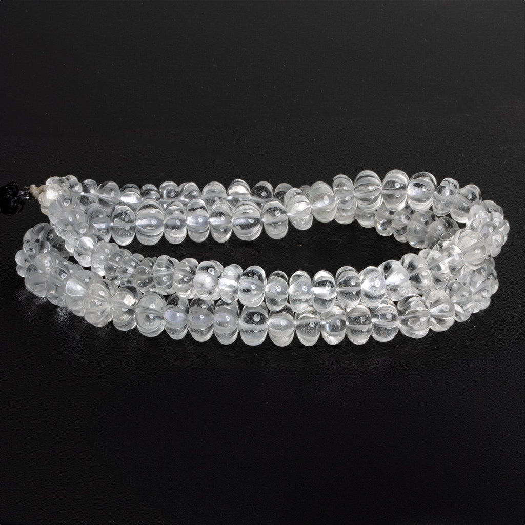 7 - 10mm Crystal Quartz Carved Melons 18 inch 83 beads - The Bead Traders