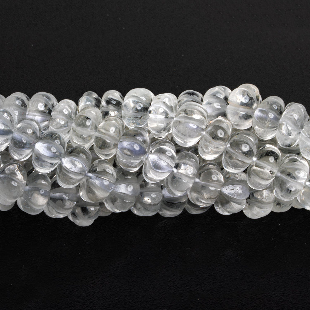 7 - 10mm Crystal Quartz Carved Melons 18 inch 83 beads - The Bead Traders