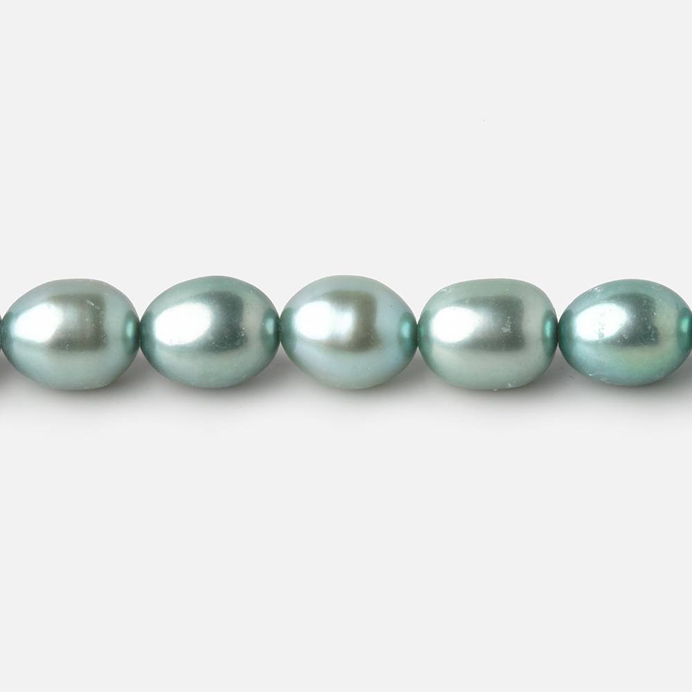 7 - 8mm Mint Green Oval Pearls 16 inch 55 beads - The Bead Traders