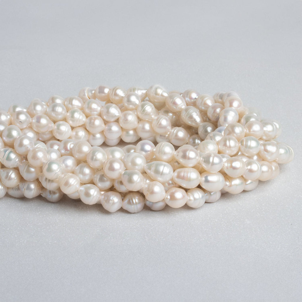 9x7mm Cream Petite Baroque Pearls 15 inch 37 beads - The Bead Traders